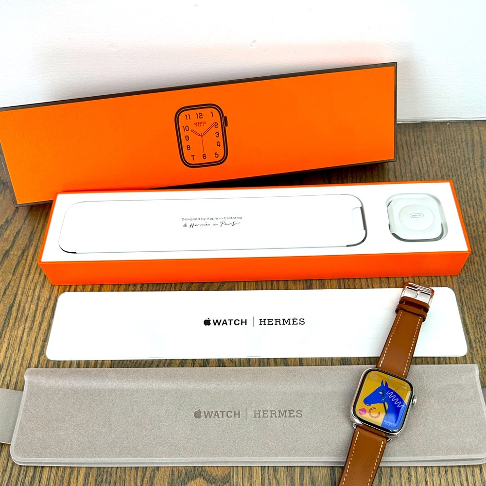 Apple Watch with Tan Band and Orange Box